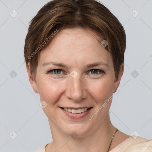 Joyful white young-adult female with short  brown hair and grey eyes