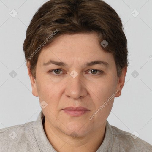 Joyful white adult male with short  brown hair and grey eyes