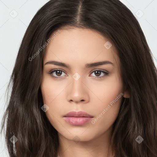 Neutral white young-adult female with long  brown hair and brown eyes