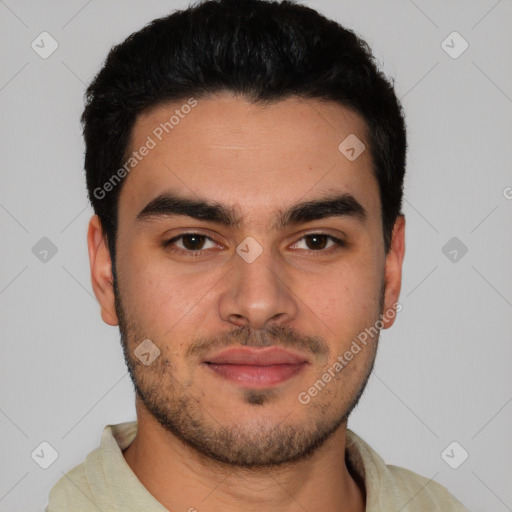 Joyful latino young-adult male with short  brown hair and brown eyes