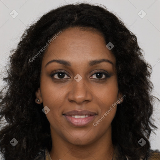 Joyful black young-adult female with long  brown hair and brown eyes