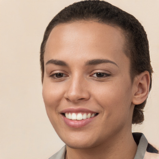 Joyful white young-adult female with short  brown hair and brown eyes