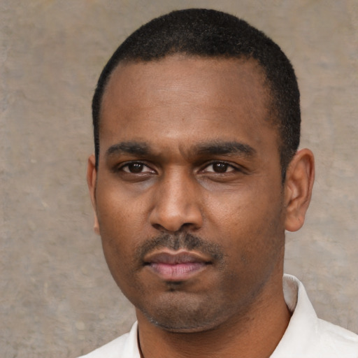 Neutral black young-adult male with short  black hair and brown eyes