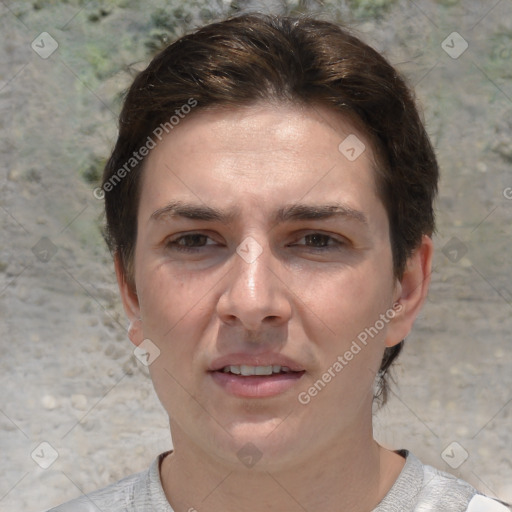 Joyful white adult female with short  brown hair and grey eyes