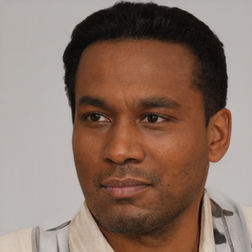 Neutral black young-adult male with short  black hair and brown eyes