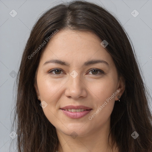 Joyful white young-adult female with long  brown hair and brown eyes