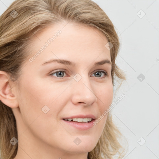 Joyful white young-adult female with medium  brown hair and blue eyes