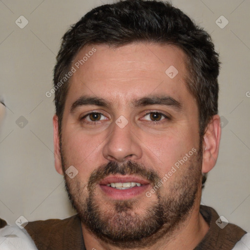 Joyful white adult male with short  brown hair and brown eyes