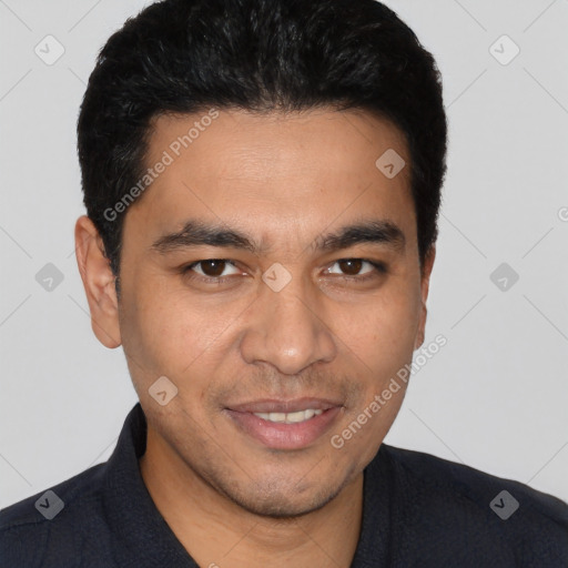 Joyful white young-adult male with short  black hair and brown eyes