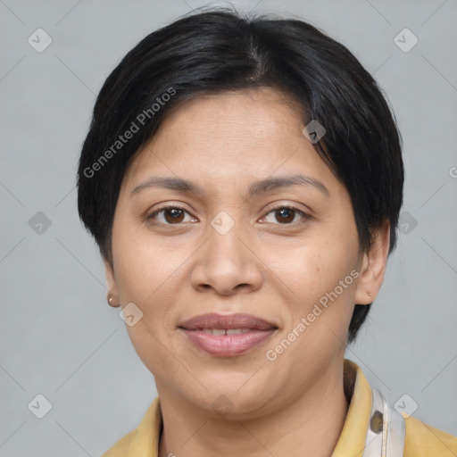 Joyful asian adult female with medium  brown hair and brown eyes