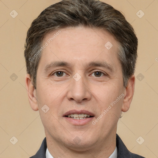 Joyful white adult male with short  brown hair and brown eyes