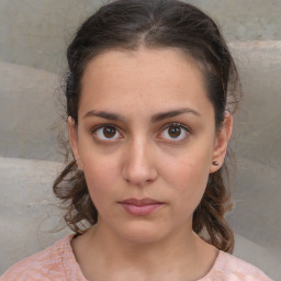 Neutral white young-adult female with medium  brown hair and brown eyes