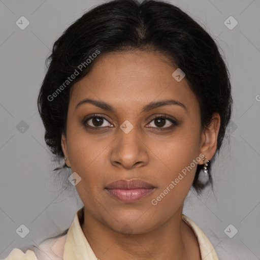 Joyful black young-adult female with medium  brown hair and brown eyes