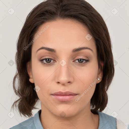 Neutral white young-adult female with medium  brown hair and brown eyes