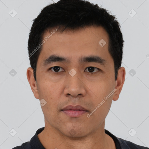 Neutral asian young-adult male with short  black hair and brown eyes