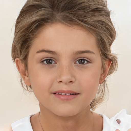 Joyful white child female with medium  blond hair and brown eyes