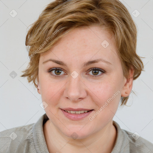 Joyful white young-adult female with medium  brown hair and blue eyes