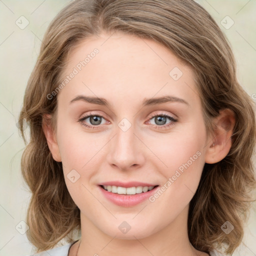 Joyful white young-adult female with medium  brown hair and green eyes