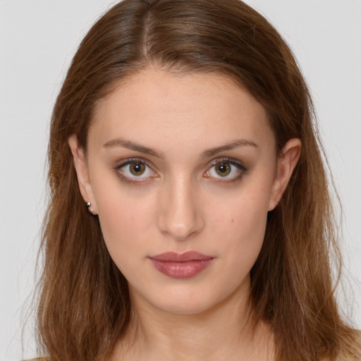 Neutral white young-adult female with long  brown hair and brown eyes