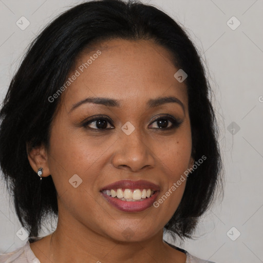 Joyful latino young-adult female with medium  brown hair and brown eyes