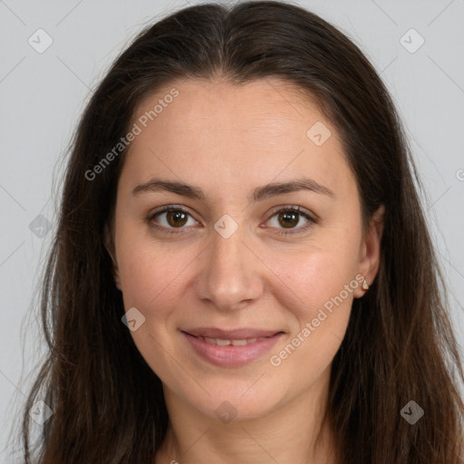 Joyful white young-adult female with long  brown hair and brown eyes