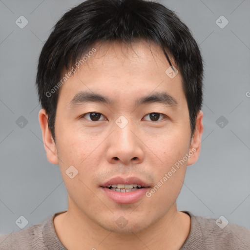 Neutral asian young-adult male with short  brown hair and brown eyes