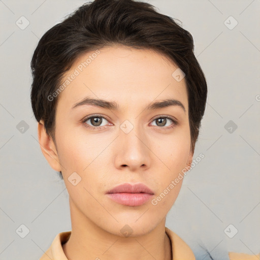 Neutral white young-adult female with short  brown hair and brown eyes