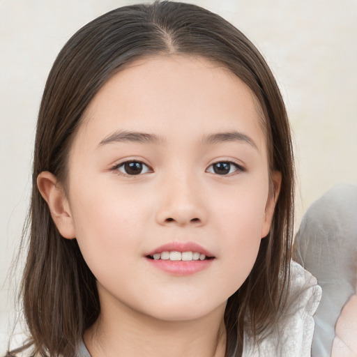 Joyful white child female with medium  brown hair and brown eyes