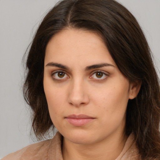 Neutral white young-adult female with medium  brown hair and brown eyes