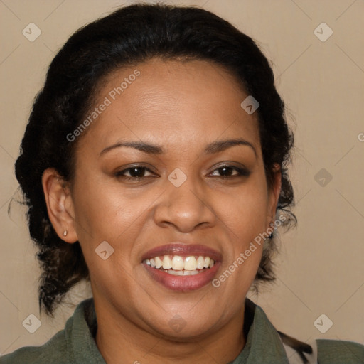 Joyful black adult female with medium  brown hair and brown eyes