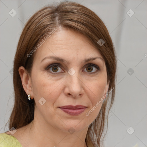 Joyful white adult female with medium  brown hair and grey eyes