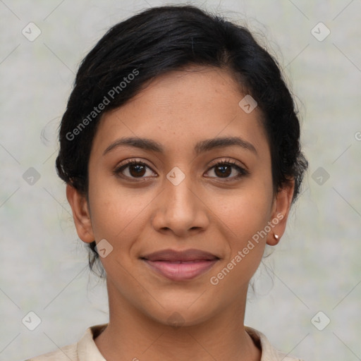 Joyful latino young-adult female with medium  brown hair and brown eyes