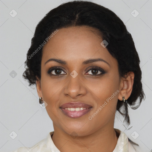 Joyful black young-adult female with medium  brown hair and brown eyes