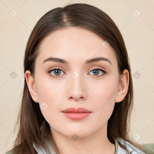 Neutral white young-adult female with long  brown hair and brown eyes