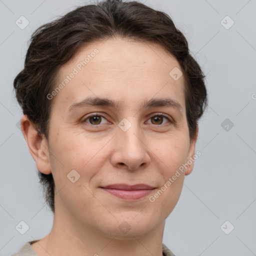 Joyful white adult female with short  brown hair and brown eyes