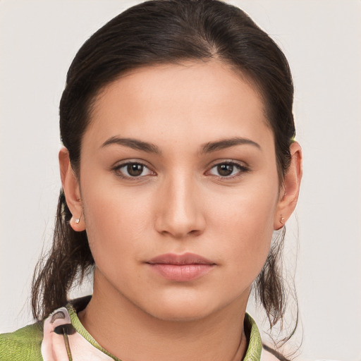 Neutral white young-adult female with medium  brown hair and brown eyes