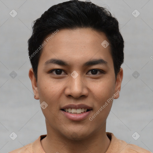 Joyful asian young-adult male with short  black hair and brown eyes