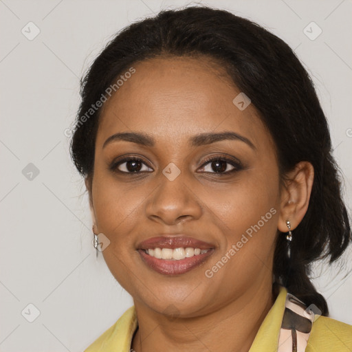 Joyful black young-adult female with medium  brown hair and brown eyes