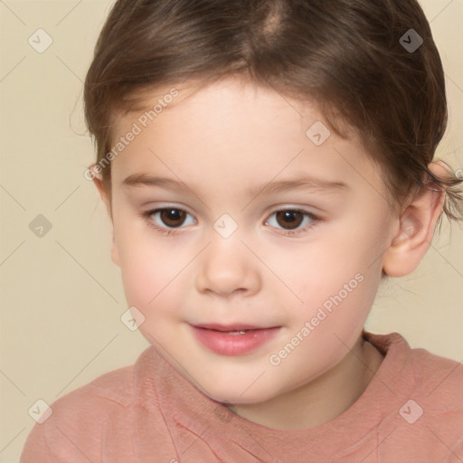 Joyful white child female with short  brown hair and brown eyes