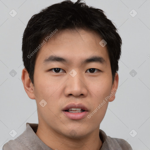 Neutral asian young-adult male with short  black hair and brown eyes