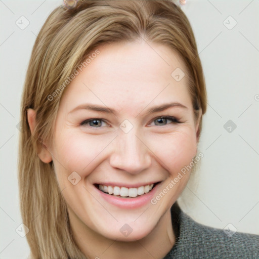 Joyful white young-adult female with medium  brown hair and grey eyes