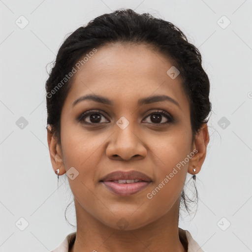 Joyful latino young-adult female with long  brown hair and brown eyes