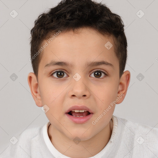 Joyful white child male with short  brown hair and brown eyes