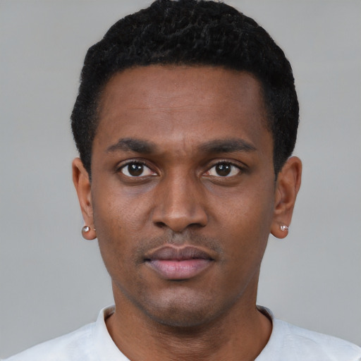 Neutral black young-adult male with short  black hair and brown eyes