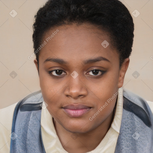 Joyful black young-adult female with short  black hair and brown eyes