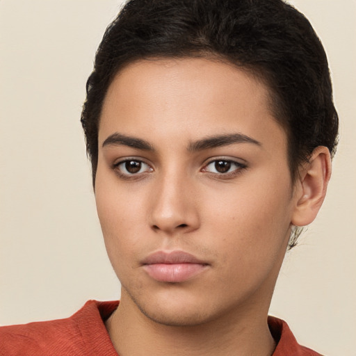 Neutral latino young-adult female with short  brown hair and brown eyes