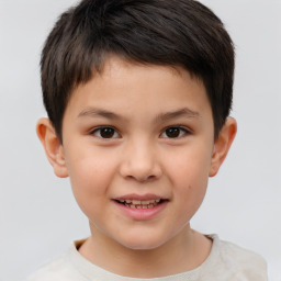 Joyful white child male with short  brown hair and brown eyes