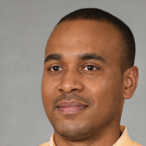 Neutral black young-adult male with short  brown hair and brown eyes