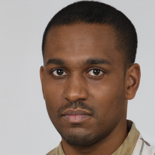 Neutral latino young-adult male with short  brown hair and brown eyes