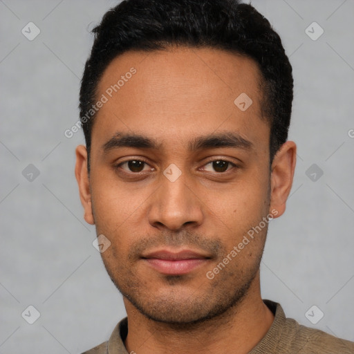 Neutral latino young-adult male with short  black hair and brown eyes